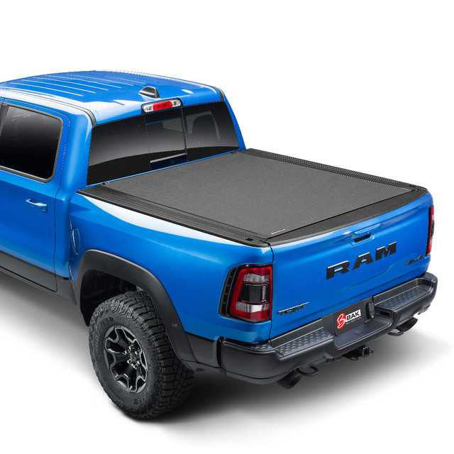 BAK Revolver X4s Hard Rolling Tonneau Cover | Fits RAM 1500 DT Crew Cab w/RAMBOX