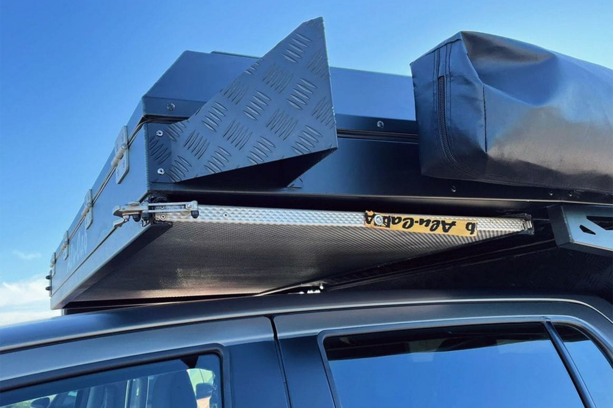 alu-cab Canopy Camper & Khaya Table Slide