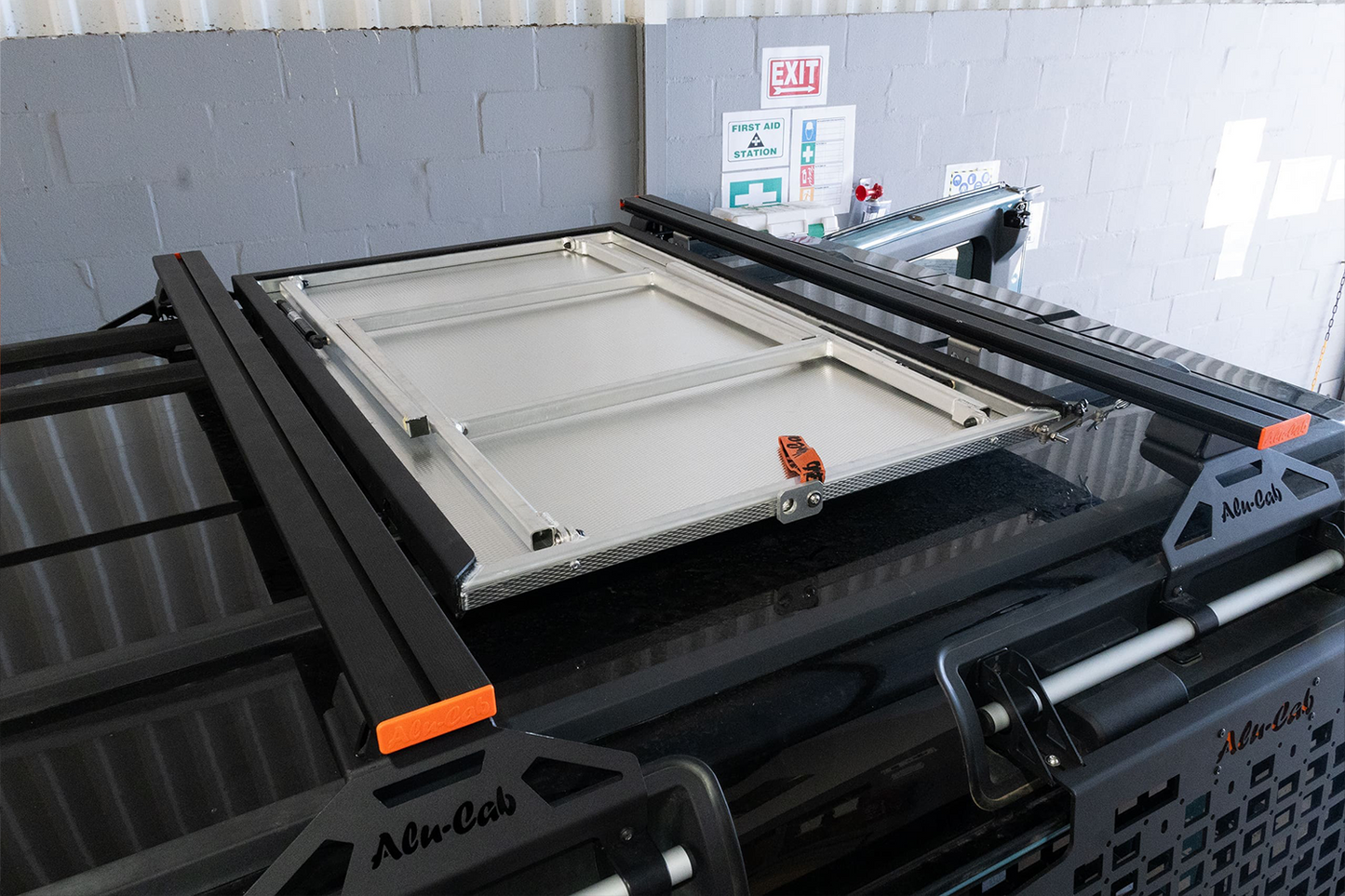 alu-cab INEOS Grenadier Table Slide