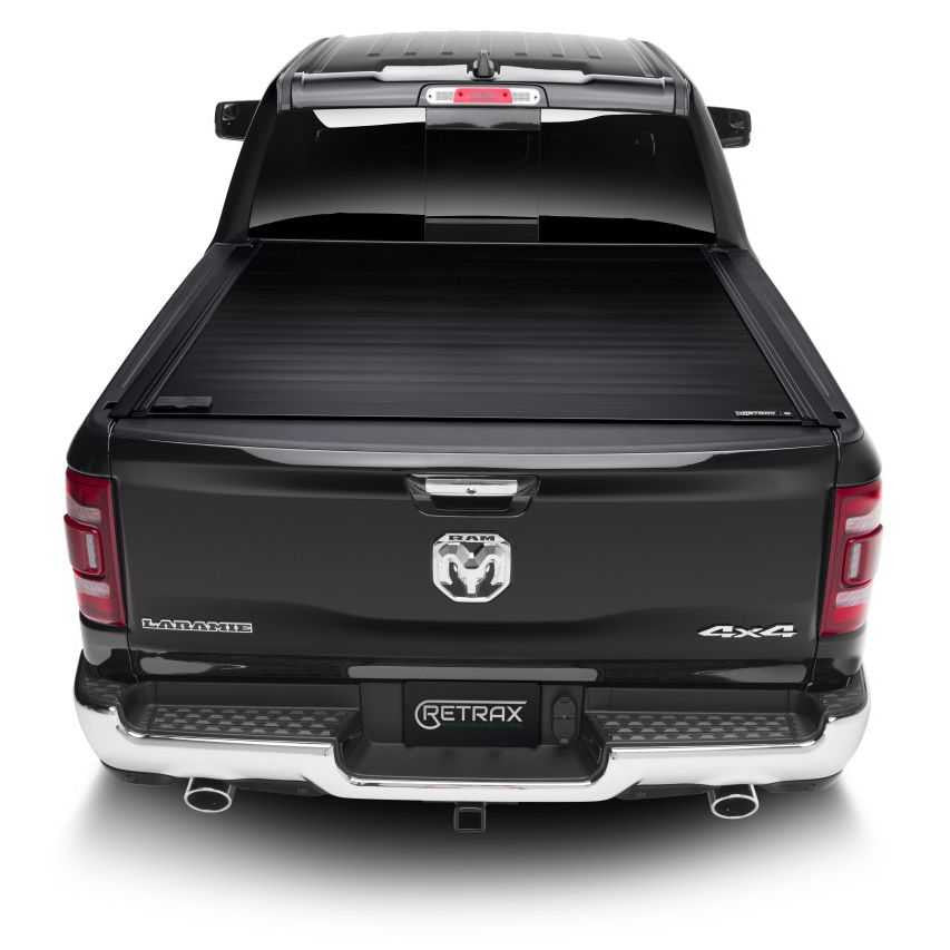 Retrax RETRAXONE MX | Manual Polycarbonate Retractable Bed Cover | RAM 1500 DT 5'7 Crew Cab w/RAMBOX (2021+)