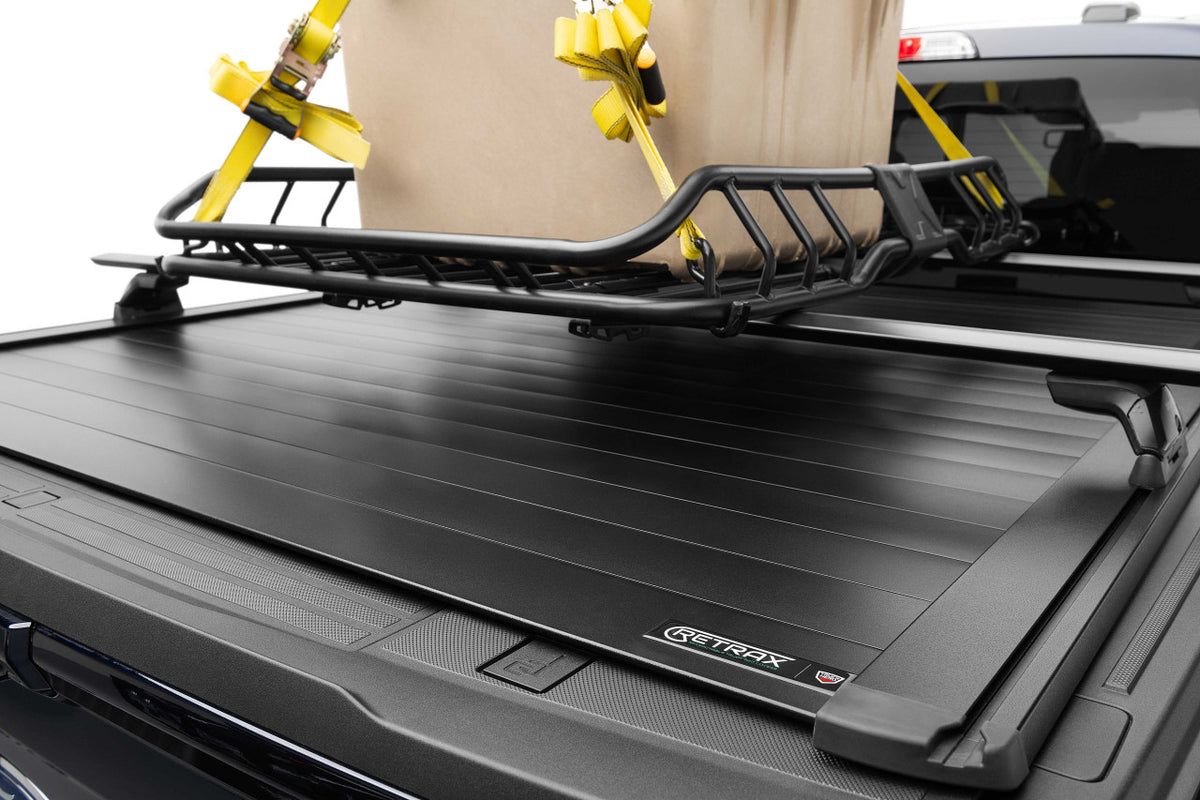 Retrax RETRAXONE XR | Manual Polycarbonate Retractable Bed Cover | RAM 1500 DT 5'7" Crew Cab w/out RAMBOX
