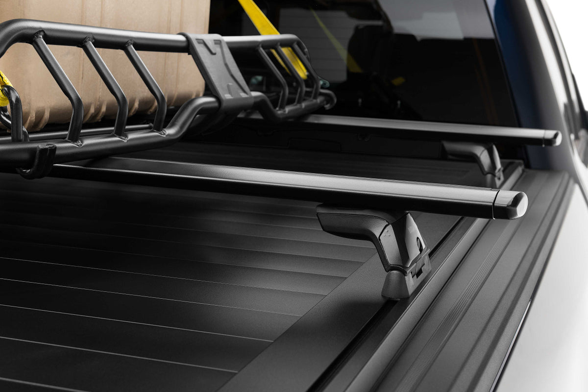 Retrax RETRAXONE XR | Manual Polycarbonate Retractable Bed Cover | RAM 1500 DT 5'7" Crew Cab w/out RAMBOX
