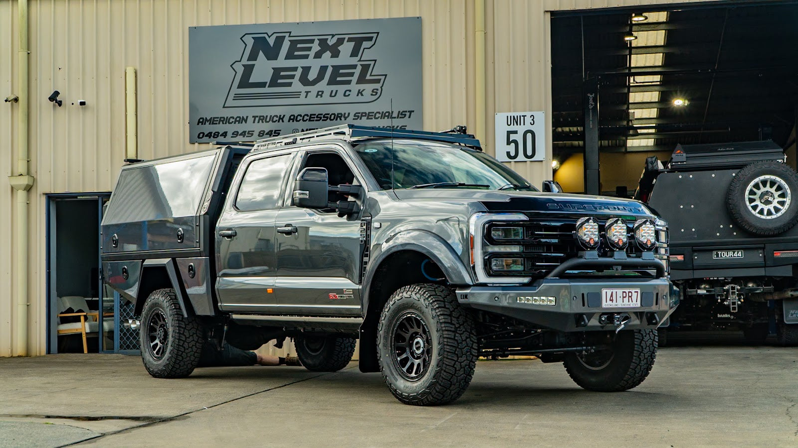 Chevrolet Silverado build outside the Next Level Trucks workshop